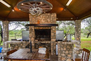 Outdoor gazebo with fireplace